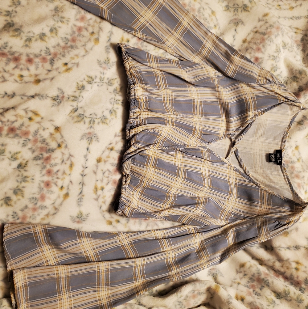 A blue squared pattern corp top